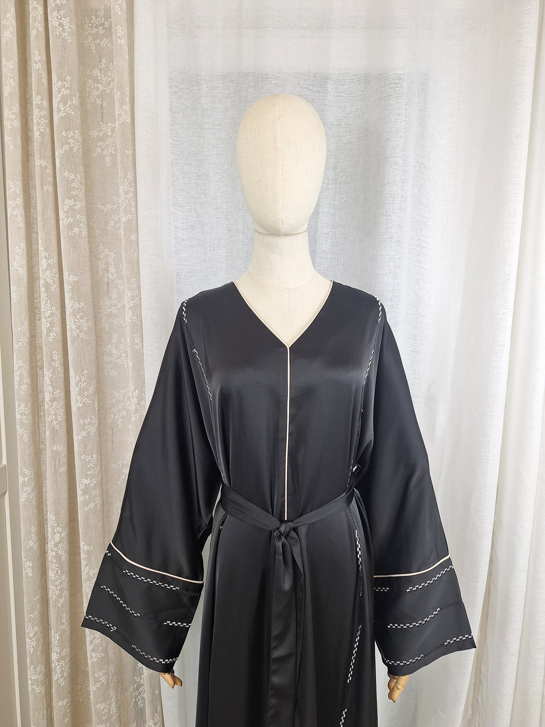 Robe longue ceinturée